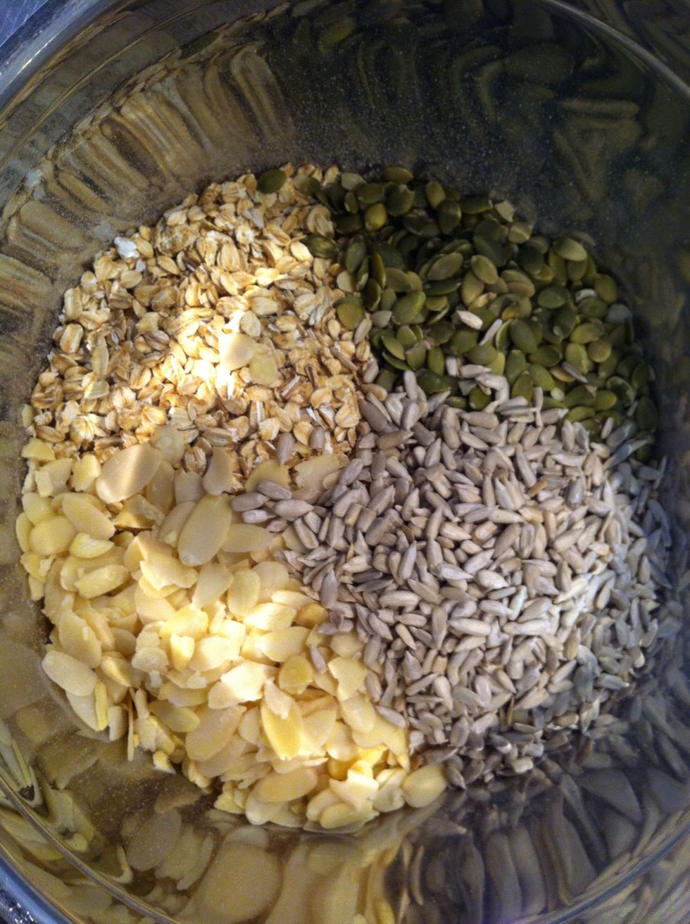 Weight oats, sunflower and pumpkin seeds and almonds into a big bowl