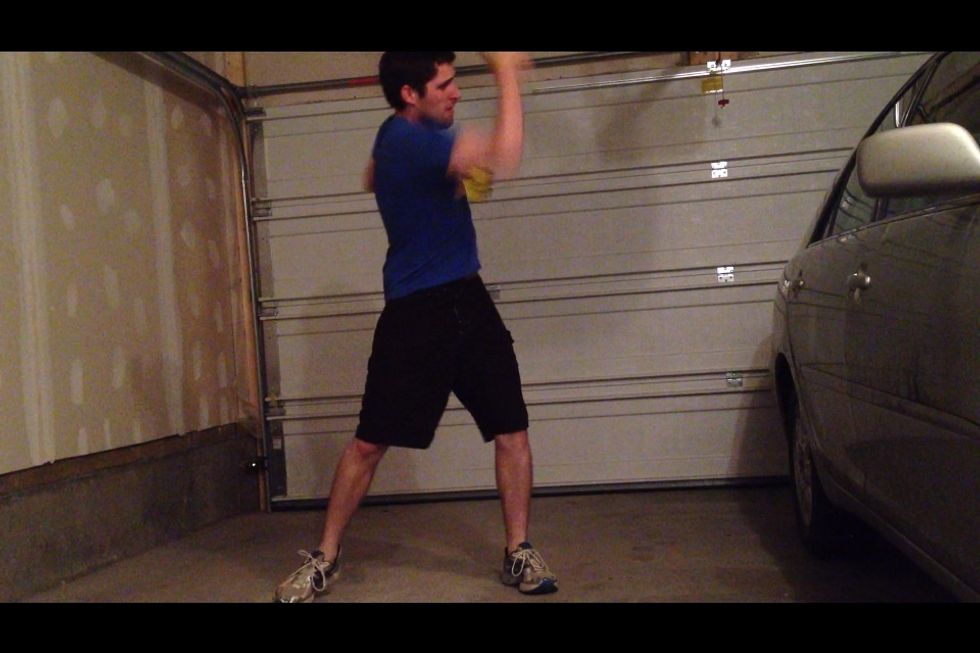 Weighted uppercuts, do 80. Make sure you dip slightly before punching upward and diagonally across your body, causing you to twist each time. Very light weights, I'm using Roma tomatoes. Mamma mia!