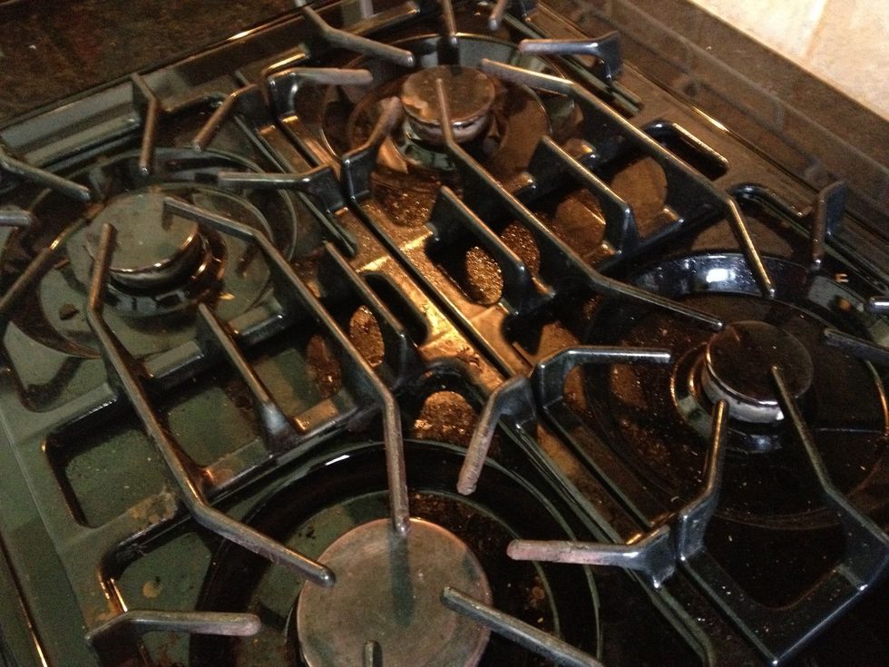 Well used cooktop. Sweep away loose debris.