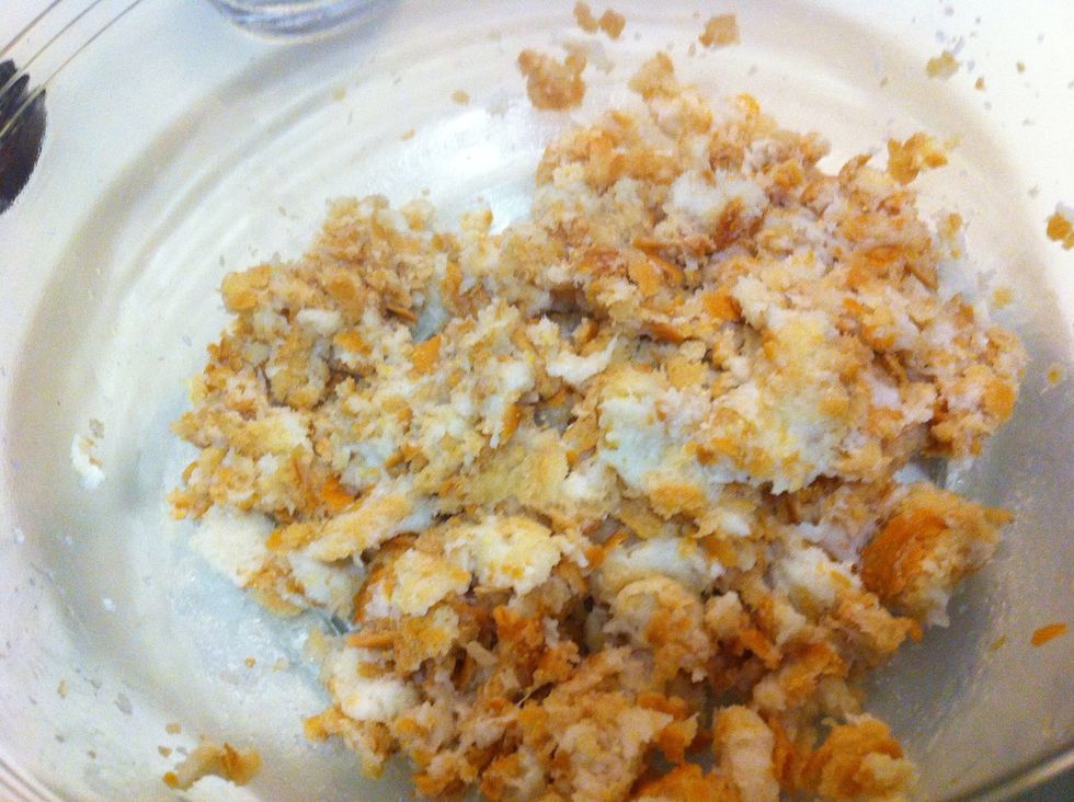 Wet the bread and mash it up so it will mix well with the other ingredients