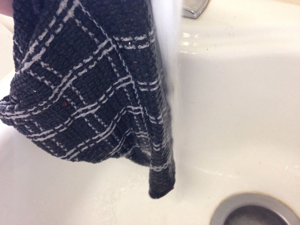 Wet your wash cloth or sponge; ring out just enough water so it's not dripping but it is still soaking wet.