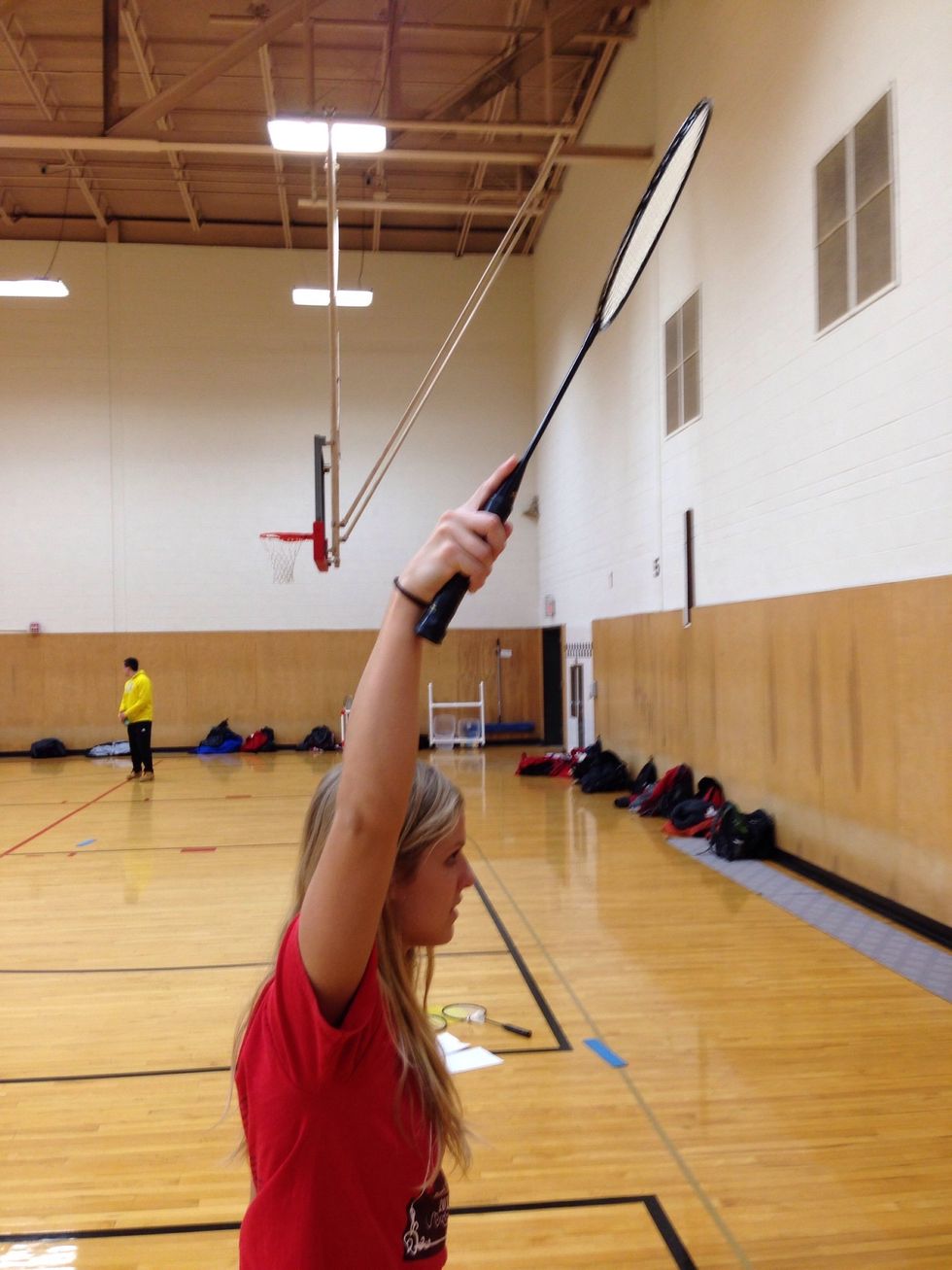 Whack the shuttle with as much force as possible, snap your wrist, follow through down and across your body.