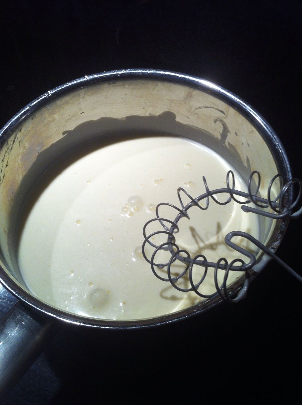 Whait for the cream to boil, not really crazyboiling But be careful not to burn it. Use a whisk and whisk gently