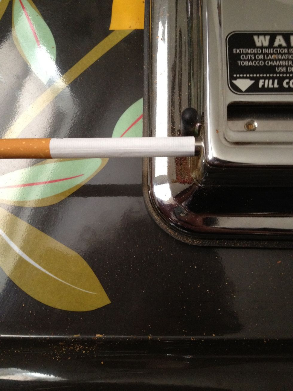 What I do to have the tube filled with tobacco to the end of it is to insert it only halfway onto the nozzle.