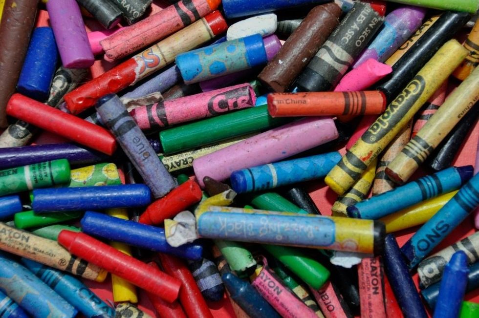 What to do with all those broken crayons at the bottom of the crayon box.... Tell your 3 year old it's a race to see who can peel them all the fastest!!