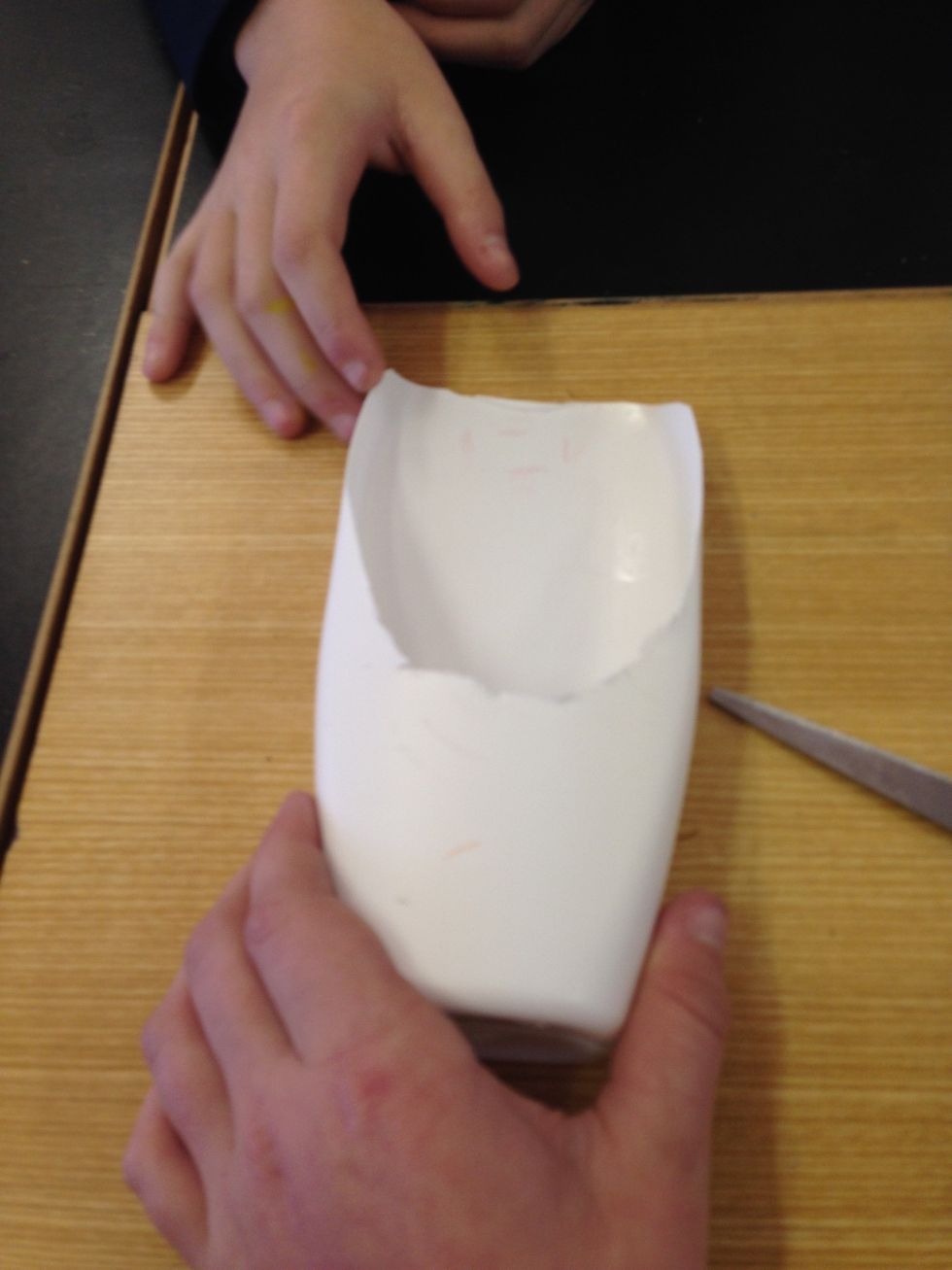 What you need to do now is you need to make a cutout that your phone can sit in so that it can sit and charge.