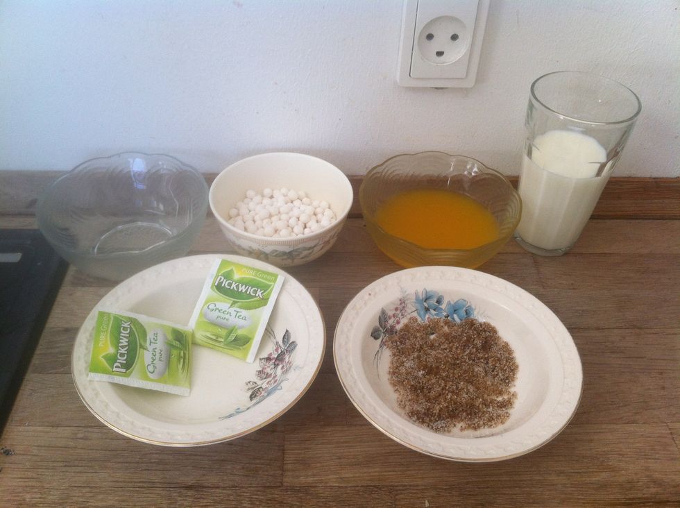 What you will need: 1 cup - water. 1/2 cup - tapioca perls. 1/2 cup - mango pure. 1 cup - milk. 2 - tea bags. 1 tea spoon - brown sugar. 1 tea spoon - sugar.