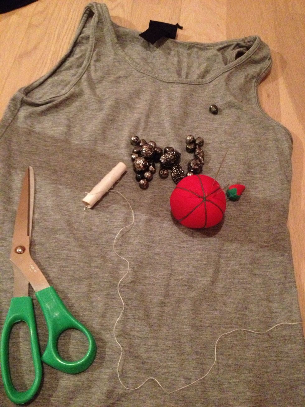 What you will need: scissors, some thread, a top, beads and a needle.