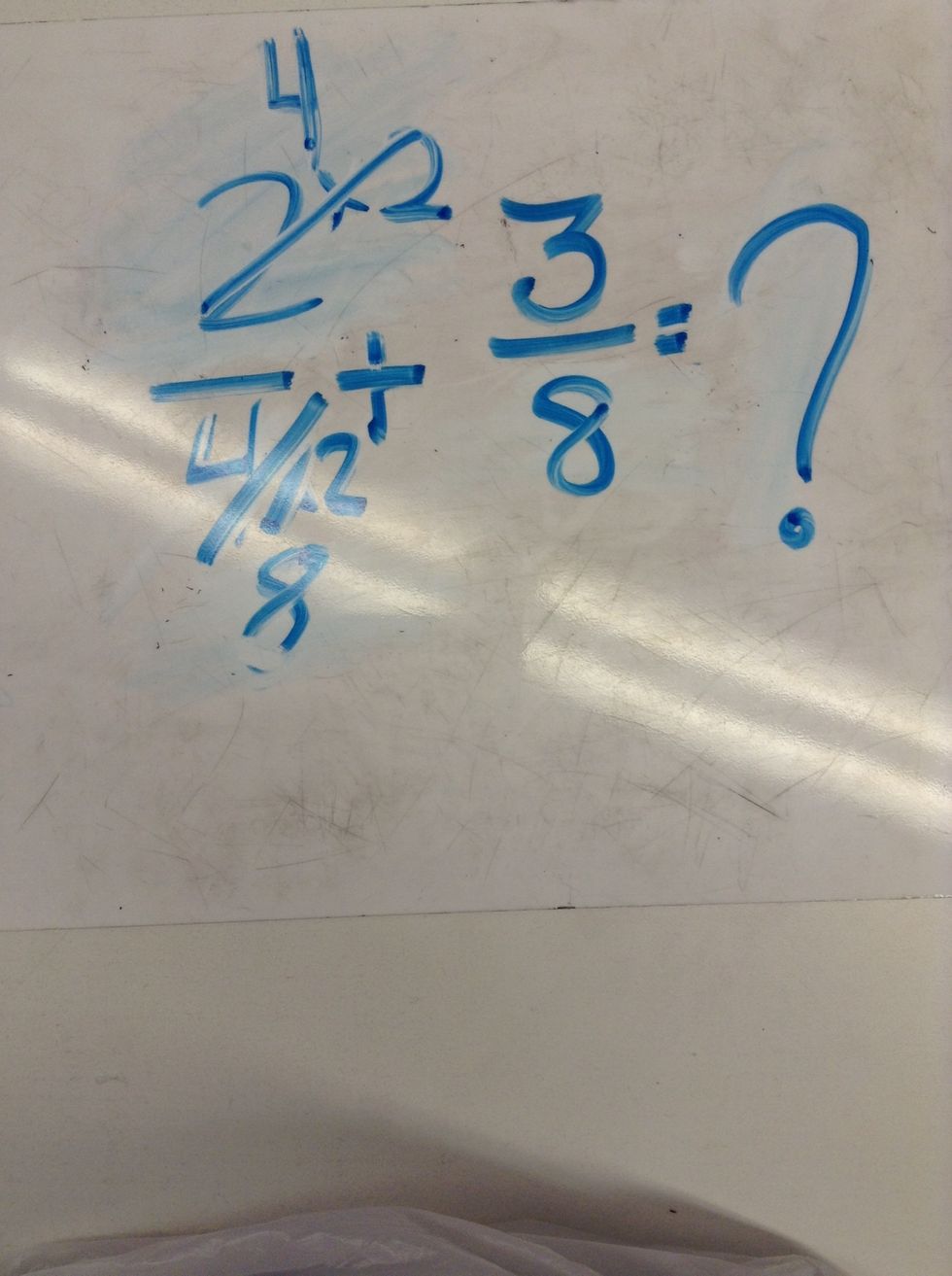 Whatever you do to the denominator you have to do to the numerator. So we did 2x2 and that equaled 4! So now we have 4/8 + 3/8=?