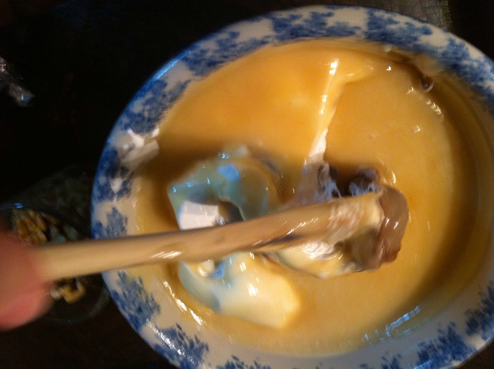 When 4 min is done..add to prepared bowl ..and mix well. By this time you may need to call upon another arm to stir!