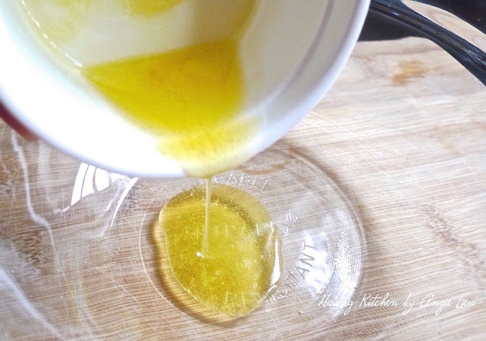 When about to roast the pumpkin seeds, add melted butter in a small bowl.