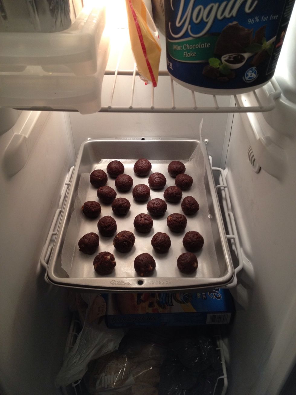When all the balls are rolled, place the tray in the freezer for an hour. This will set the cake balls so they're ready for the final step.
