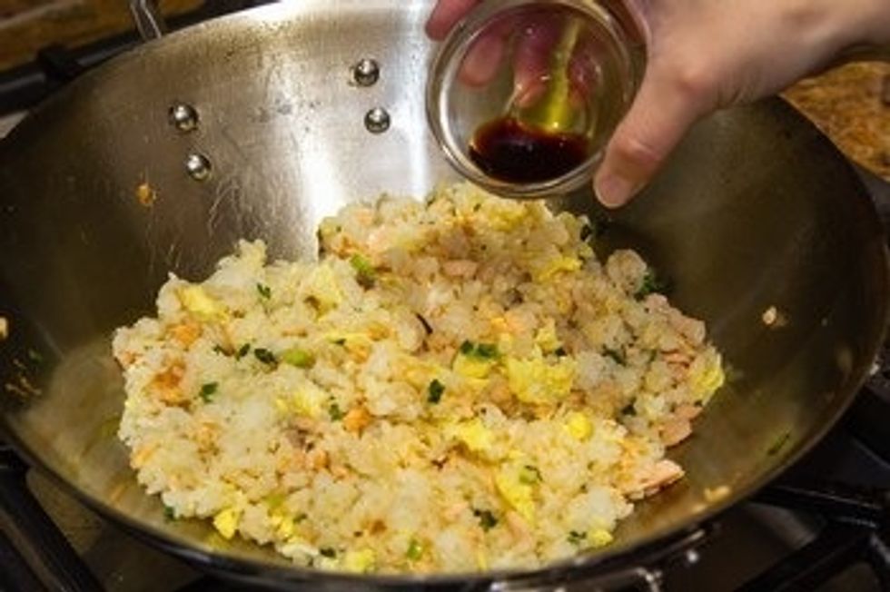 When all the ingredients are mixed well, add soy sauce, salt, white pepper, and freshly ground black pepper.