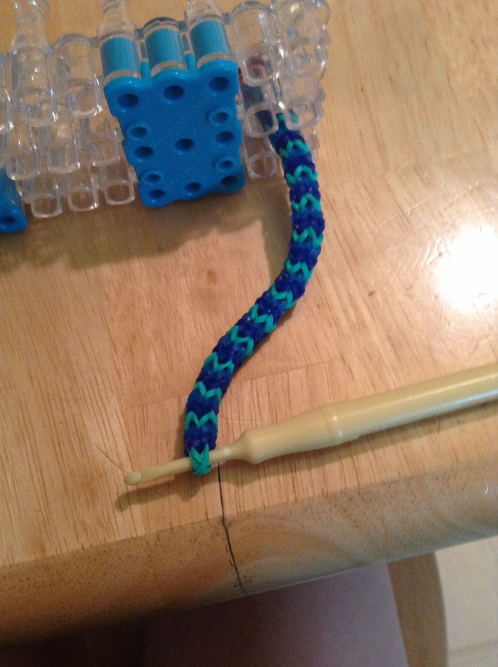 When at desired length put hook through the beginning band