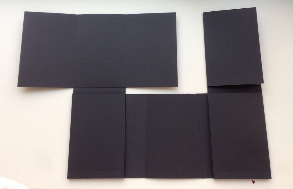 When attached, folded rectangles can open out for photos.