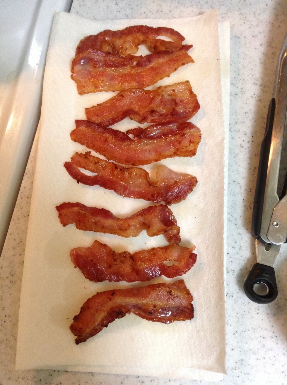 When bacon is cooked, place on a paper towel collect the grease