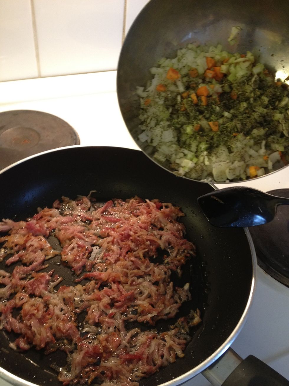 When bacon is golden, pour in the bowl of vegetables and herbs, and let it Cook for approx 5-10 minutes.