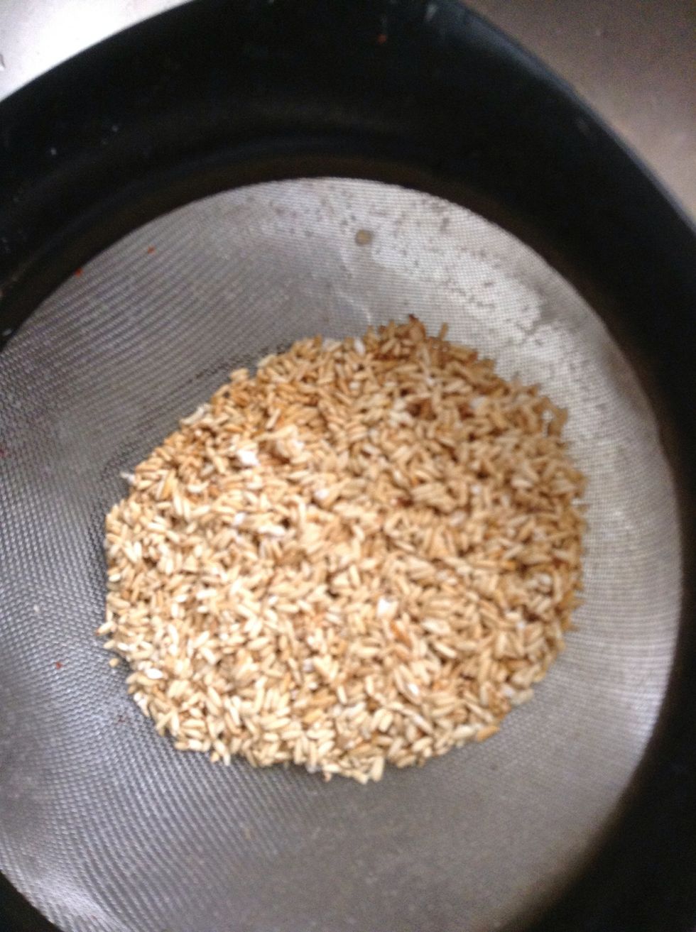 When brown pour into strainer, until all of the oil is drained.