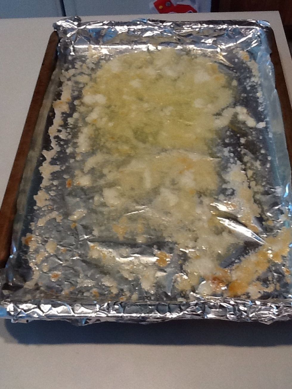 When butter is melted, remove pan from oven.