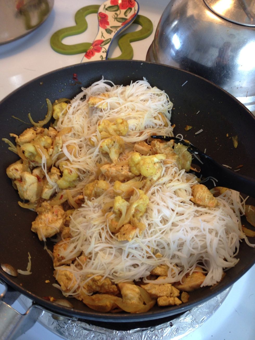 When chicken is cooked, add in the cooked, cooled vermicelli.