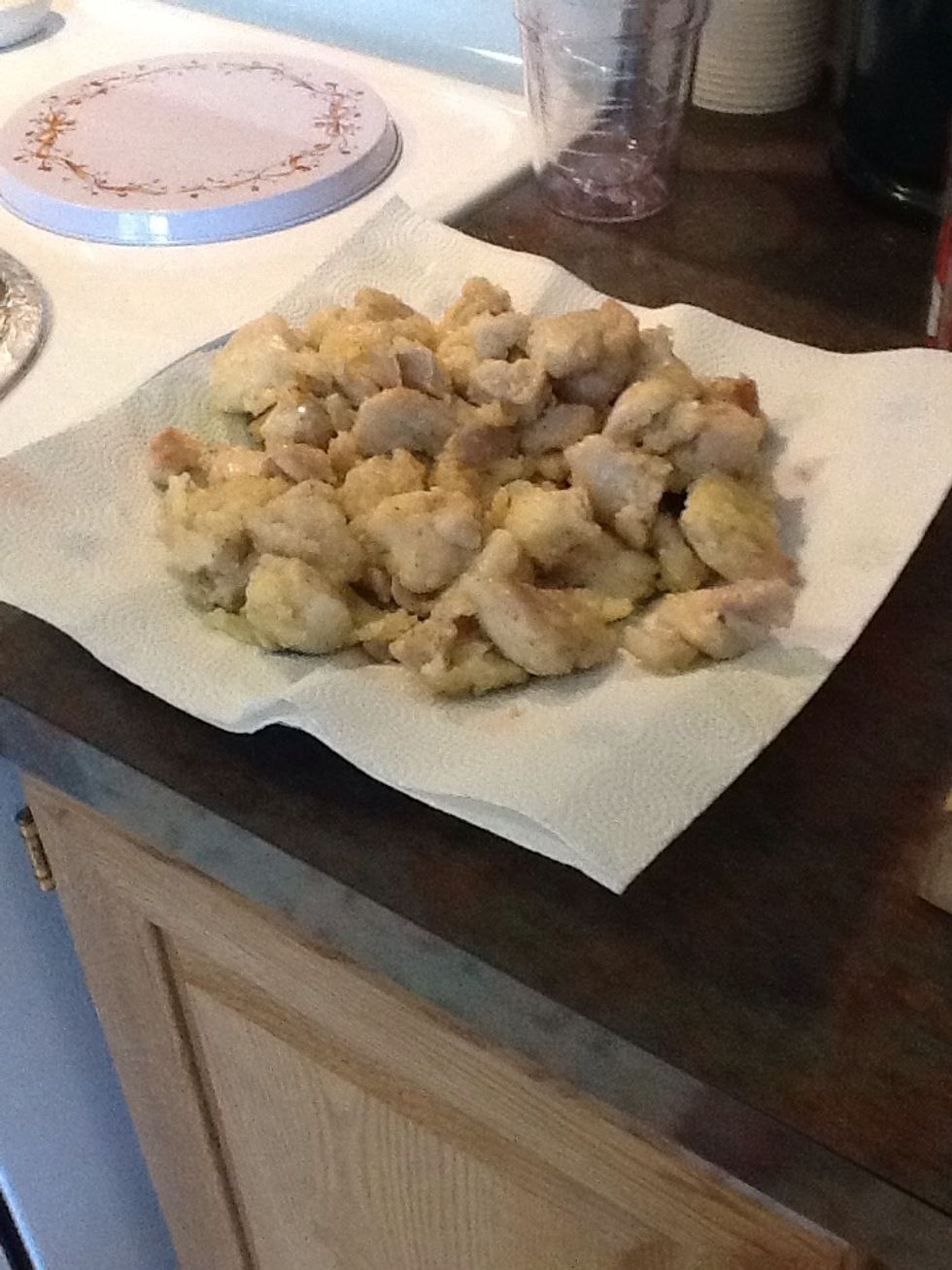 When chicken is ready, place it on a paper towel lined plate