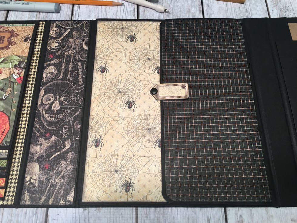 When closed, this section will look like this.  Measure, cut and attach patterned papers to all of the pages of the album in this section.  Ink edges if desired before attaching.