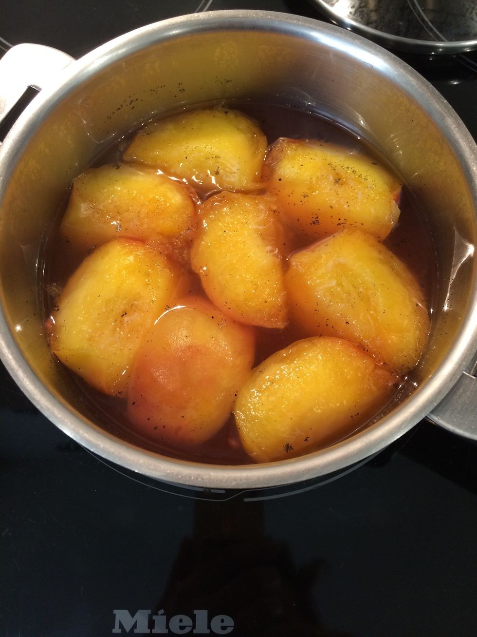 When cooked leave to cool down peel the peaches and put them in the fridge with the syrup... Untill needed they could b prepared well in advance.