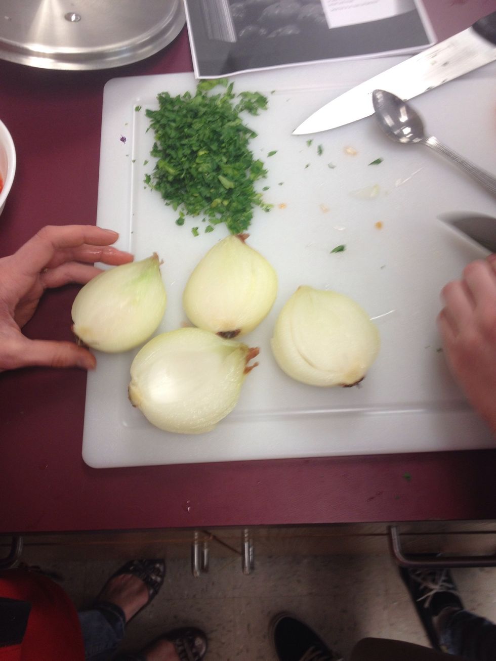 When cool enough to handle, remove inner half of onion, leaving the outer 3 or 4 layers intact