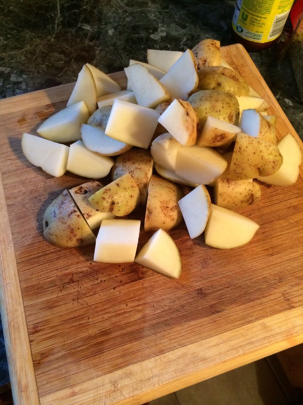 When done cleaning your potatoes chop them up. Make sure they are all the same size.