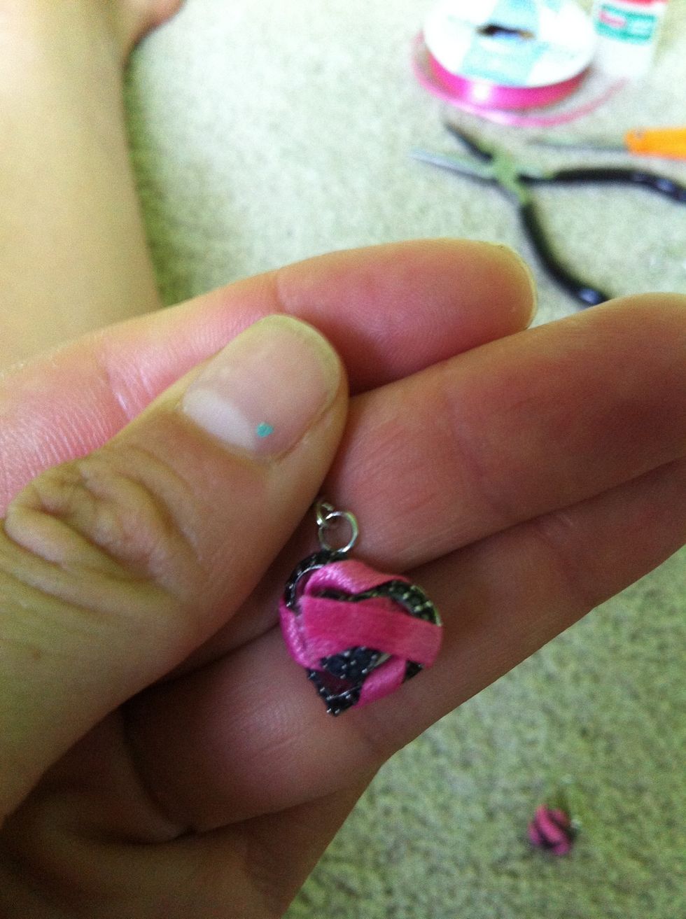 When done, secure the ribbon atop the other ribbon in the back with super glue.