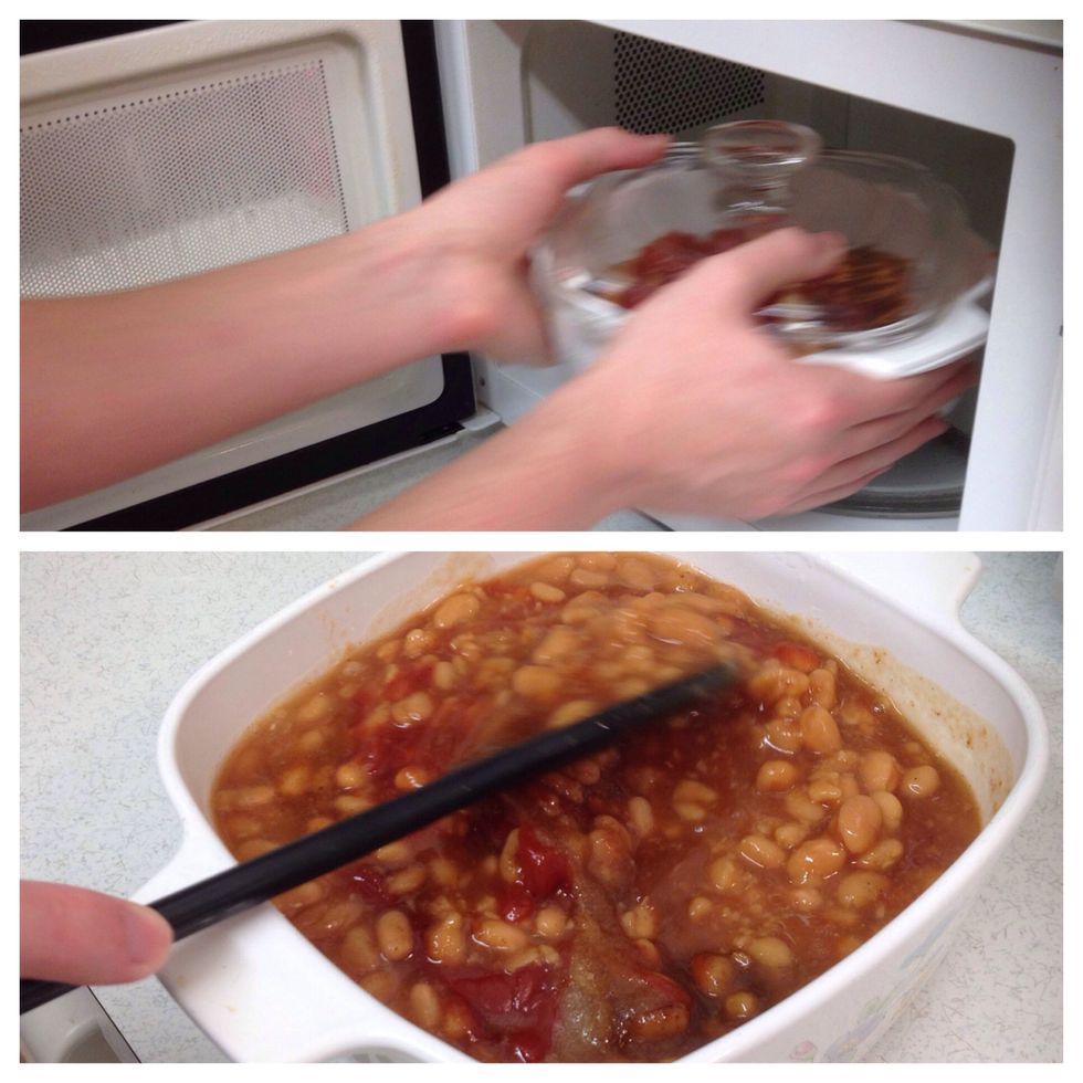 When done, take the casserole dish out and mix the ingredients with the spoon.