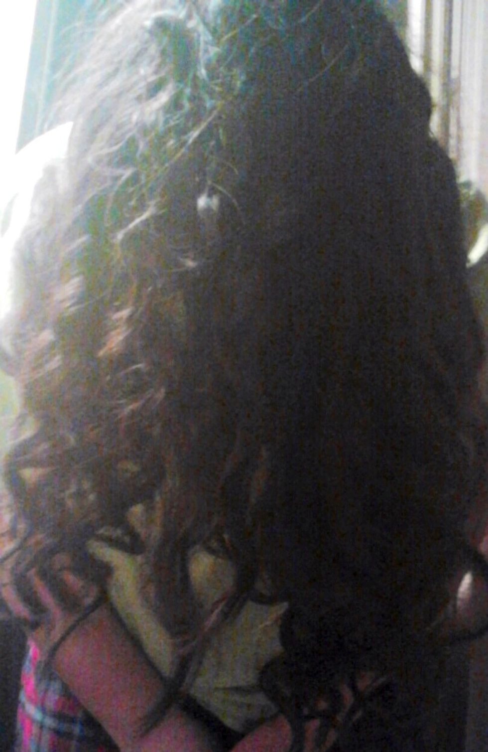 When done with your top section, flip your hair over giving a quick spritz of hairspray.