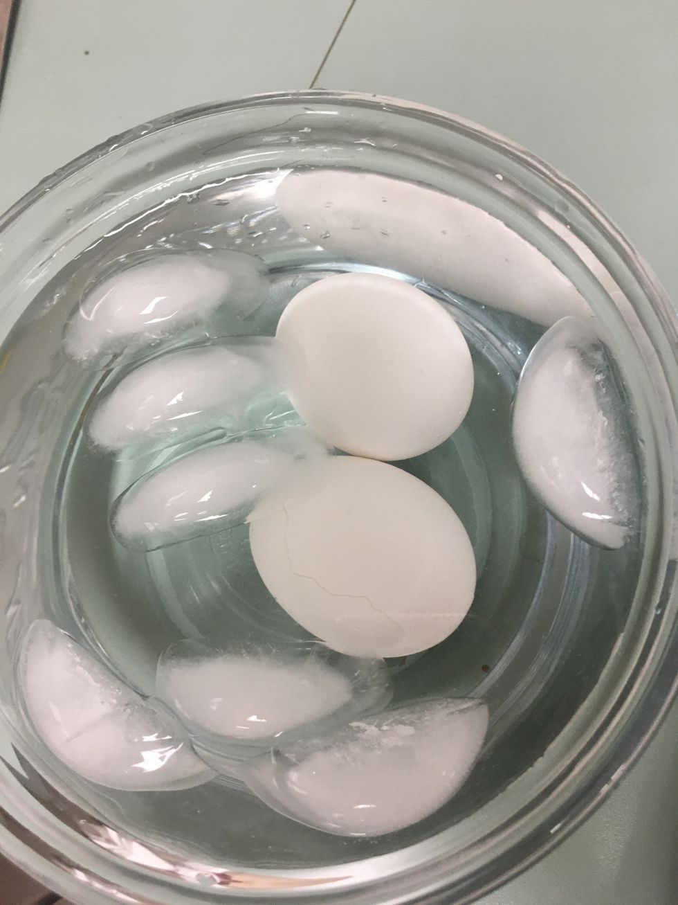 When eggs are done boiling immerse in cold water. (This will stop it from cooking.)