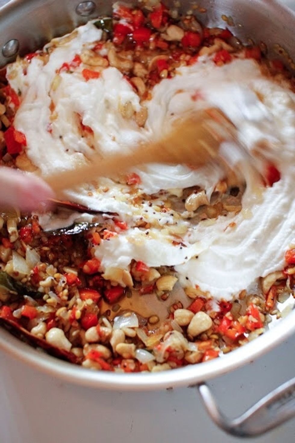 When everything is cooked, take the pan off the heat and add in the yogurt and sour cream if you're going to include it too.