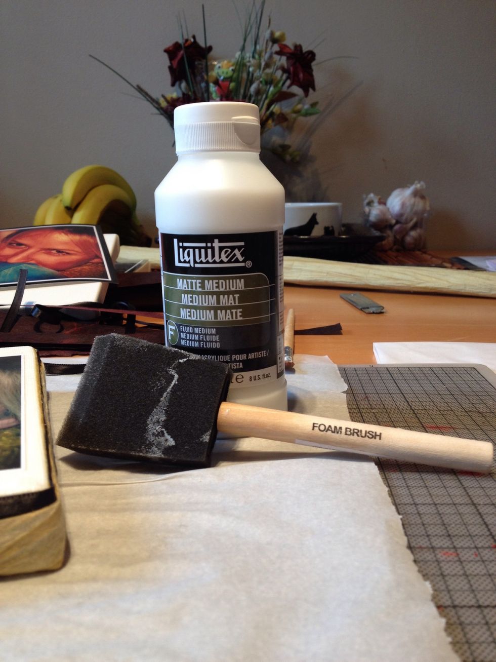 When everything is dry, use a sponge or cloth to dab on acrylic paint to cover any spaces between side paper strips and the