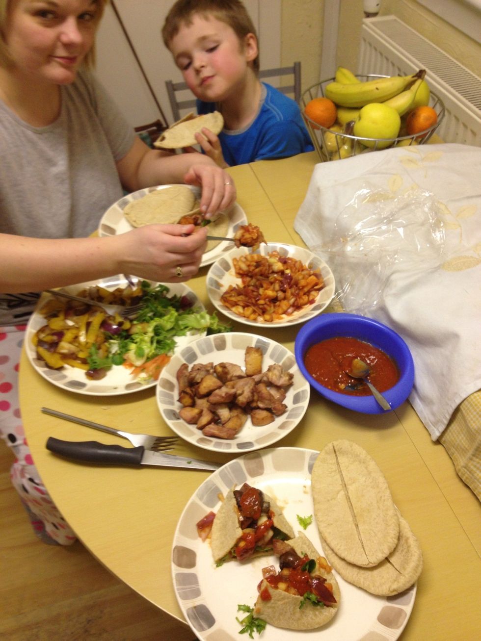 When everything's done serve in separate dishes and let everyone fill their pita breads to the brim! :0) I served mine with salad, volcano sauce from my snap guide, and my spiced onions....