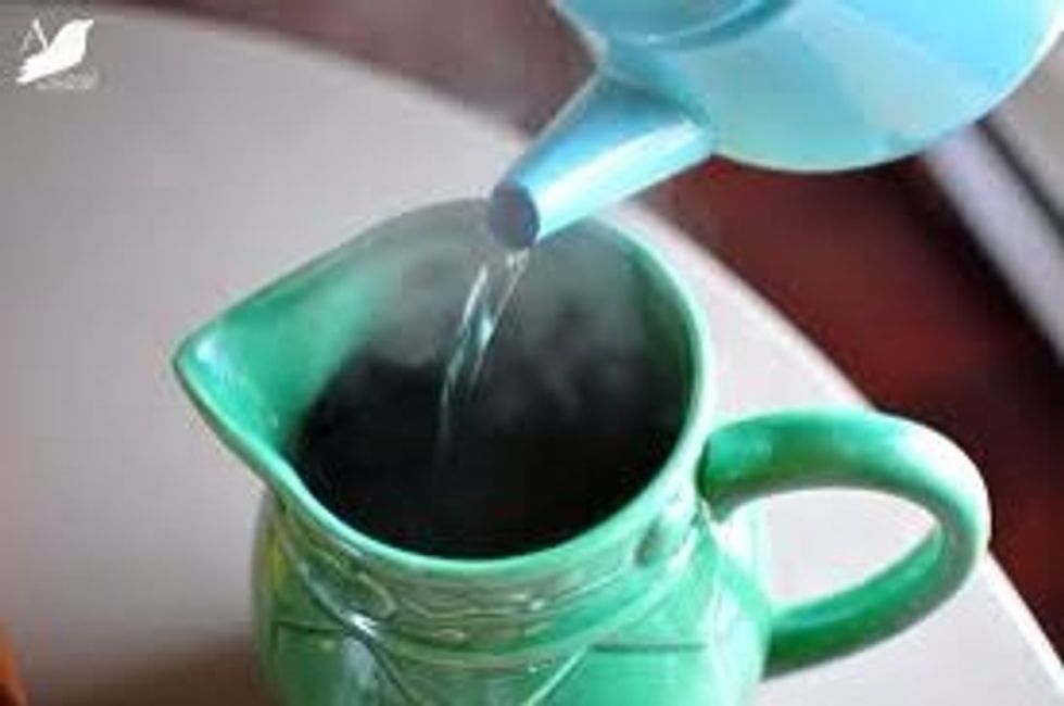 When finished adding the milo& sugar then add the hot boiled water when finished boiling, not all the way to the top just enough so you can still add the milk!