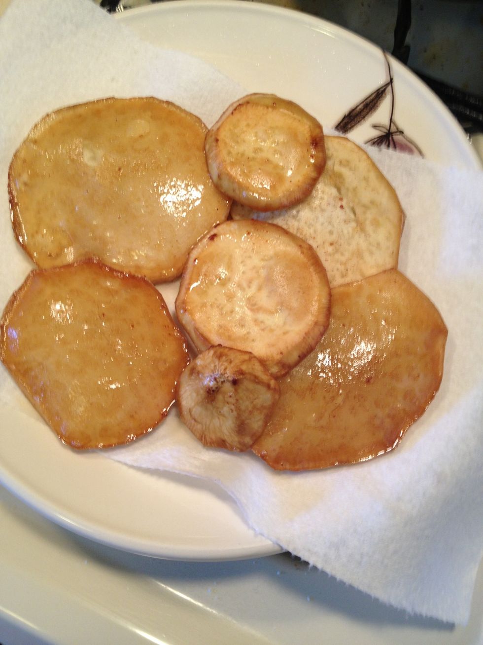When finished cooking put them on a plate lined with paper towel to absorb the extra oil