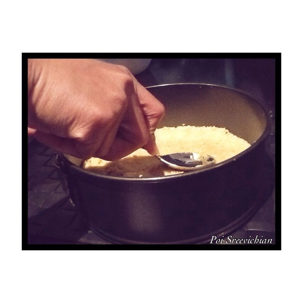 when finished out your crushed biscuits into a cake tin and flatten it down with a spoon then put it in the freezer for 30 minutes