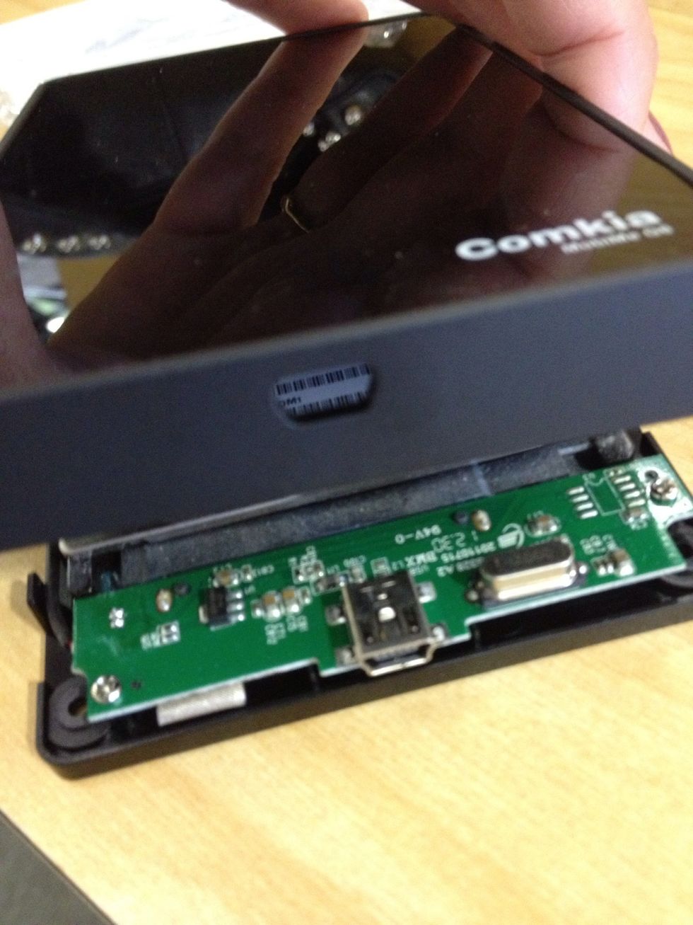 When finished, snap on the top. Line up the openings for the USB cord.