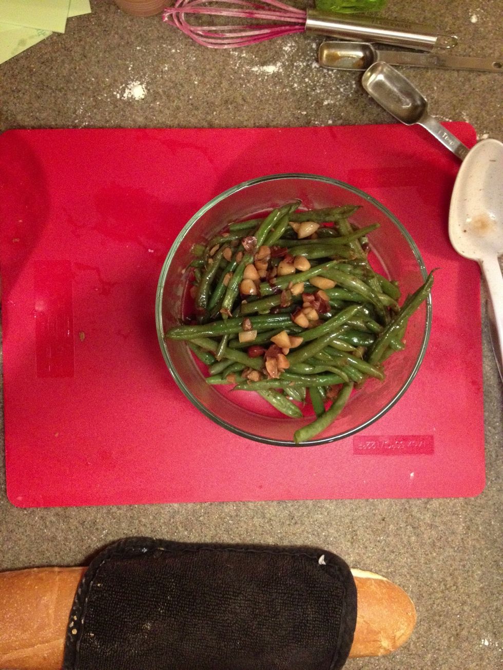 When finished, you can toss all contents of the pot into a serving dish. The liquid helps keep the beans warm while you plate the rest of your meal.