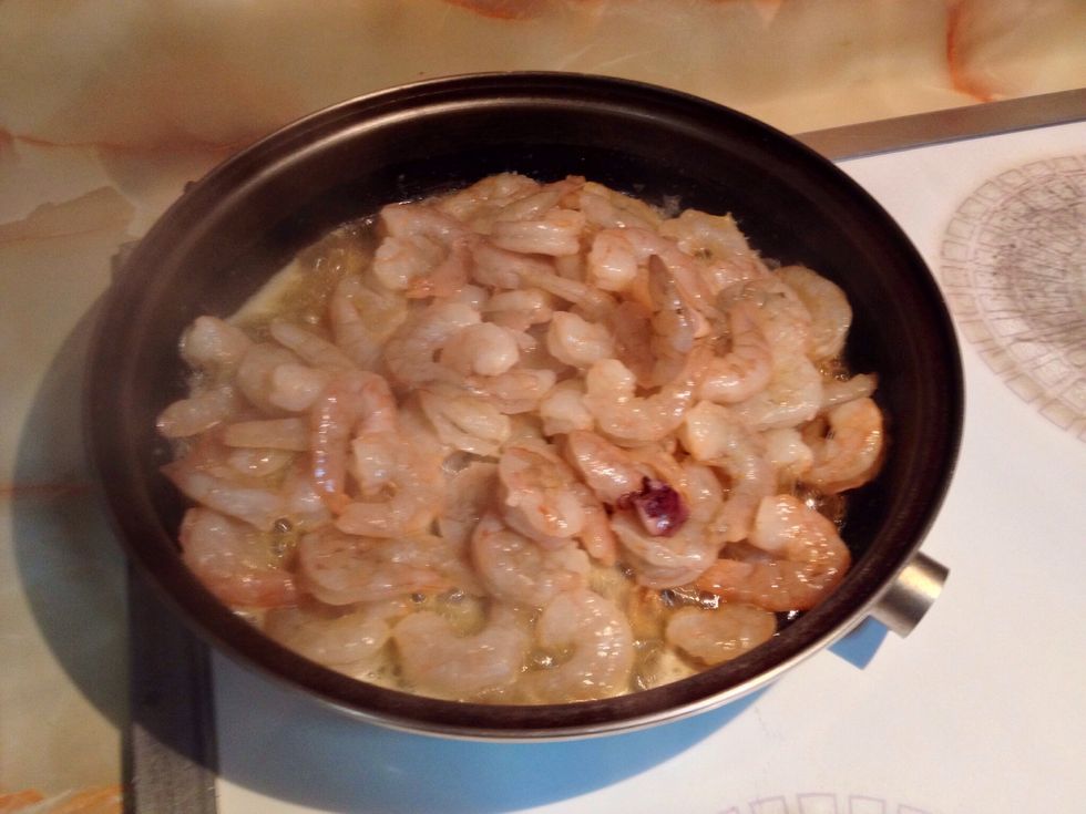 When foam subsides, add shrimp and cook until they just turn pink. Remove from pan and reserve.
