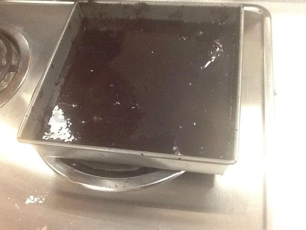 When frosting is thin and runny, and brownies are ready to take out of the oven, put the frosting as a thin layer over brownies.