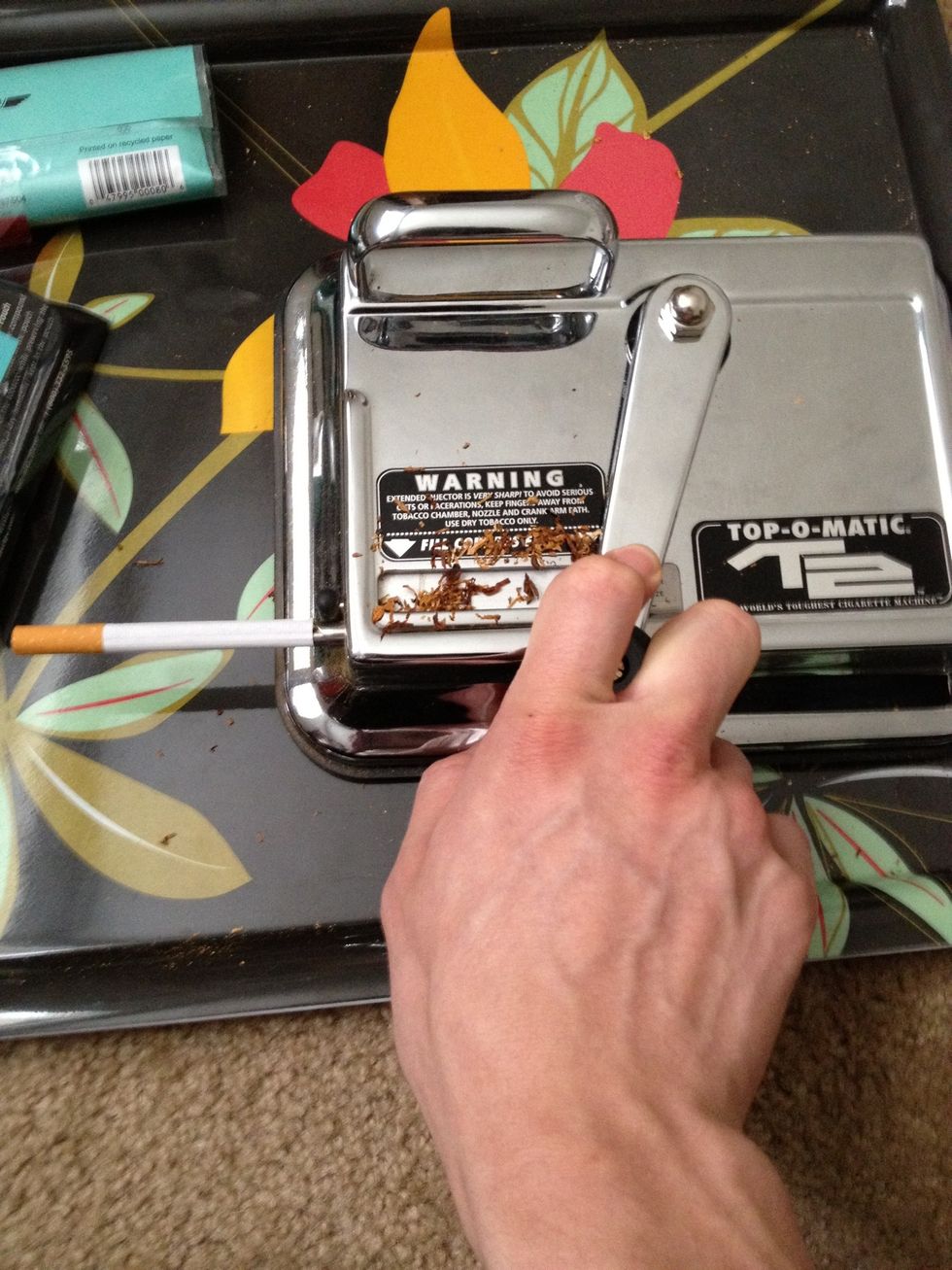 When fully slide across the smoke will ether push off or will slide down the nozzle slighty.