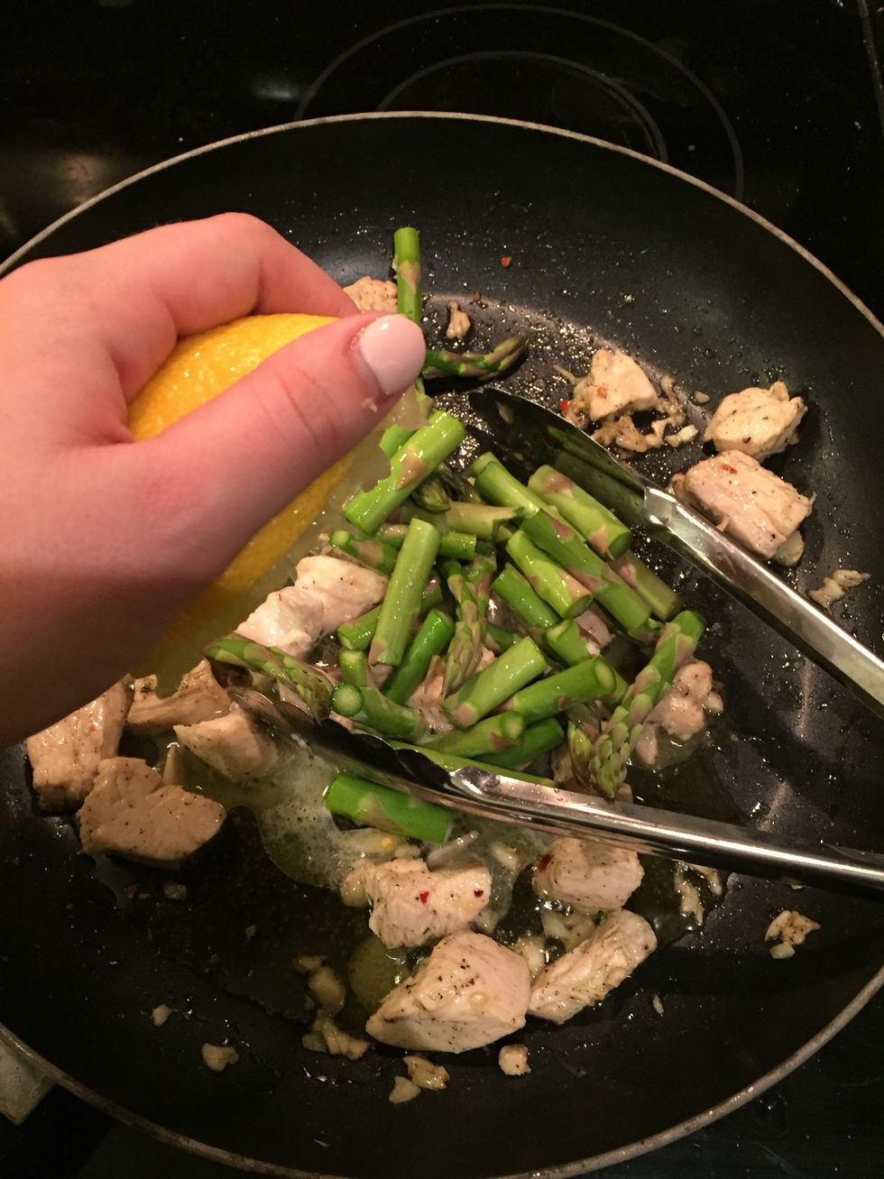 When garlic is fragrant, add lemon juice and be careful not to get any seeds into the pan.