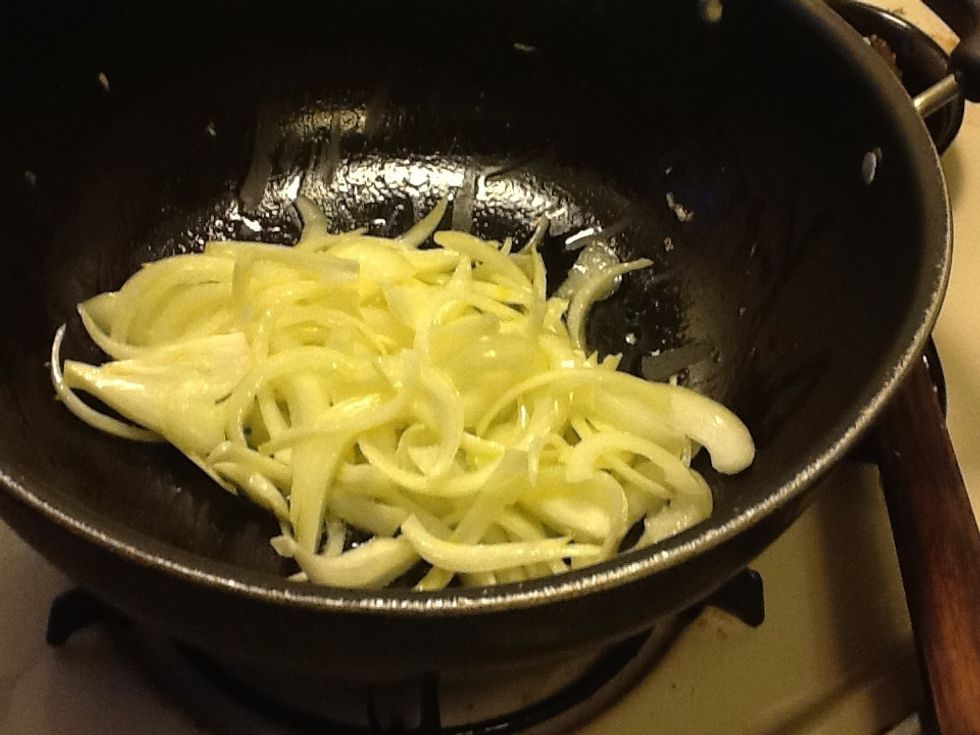 when hot add minced garlic and chopped onions....let it cook till onions turn golden yellow (it takes about 5minutes)