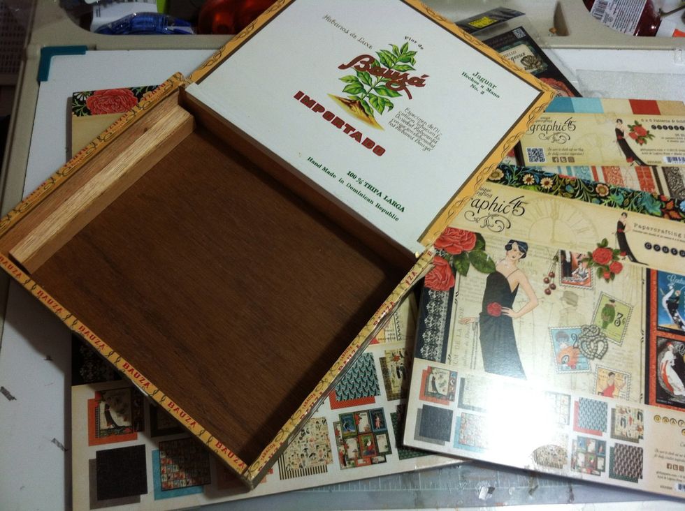 When I found this old wooden cigar box in a local thrift shop I wanted to give it a new life by altering it with Graphic45 Couture.