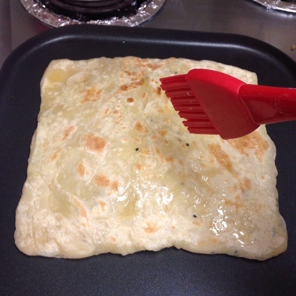 When I slip it over I brush tops with butter on both sides.