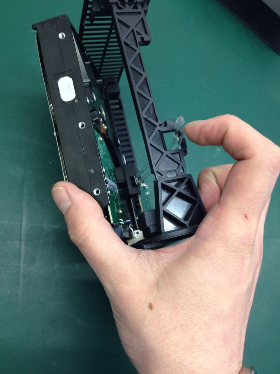 When in this position take note of the second piece of transparent plastic (by my finger in the photo).