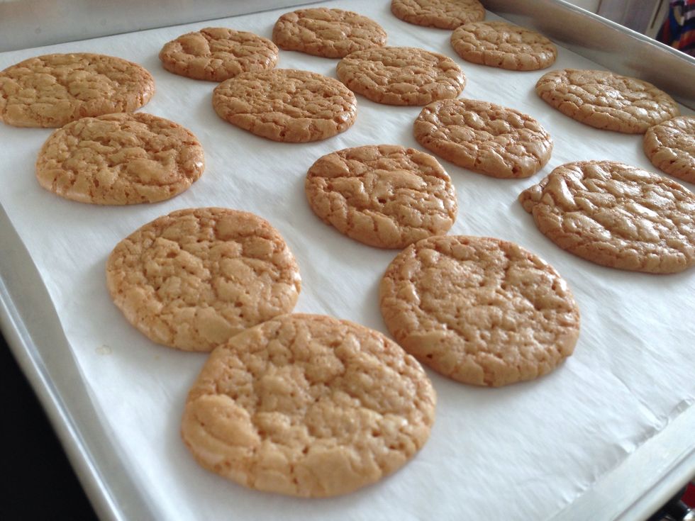 When it done, move it to cookie rack. When u still place it at the pan, the cookies will continue bake and it might get hard.